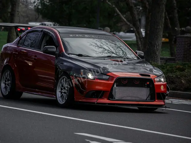 2010 Mitsubishi Lancer Design — Garaj Aracı — fotoğraf 2